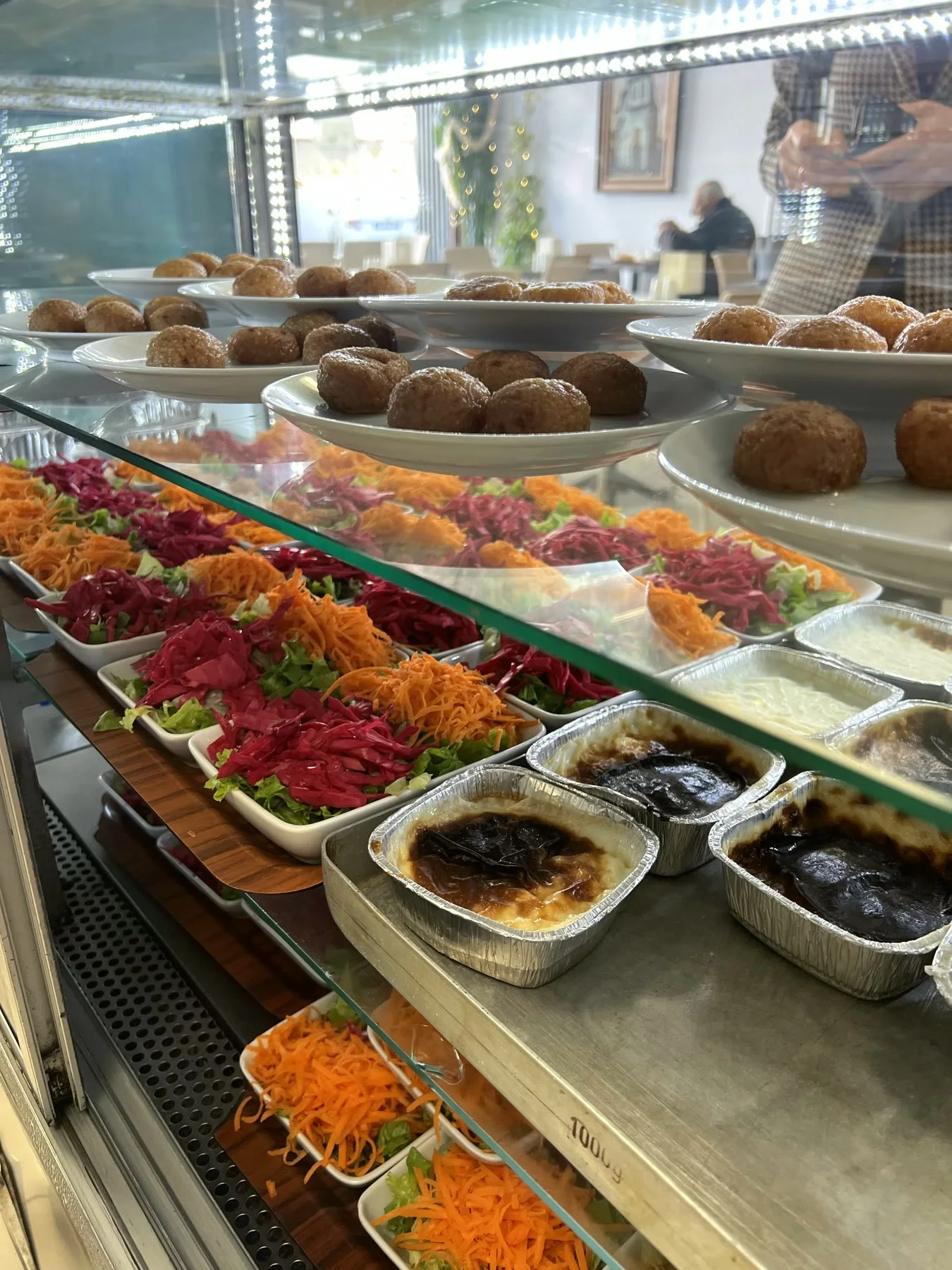 Desserts and salads at the counter