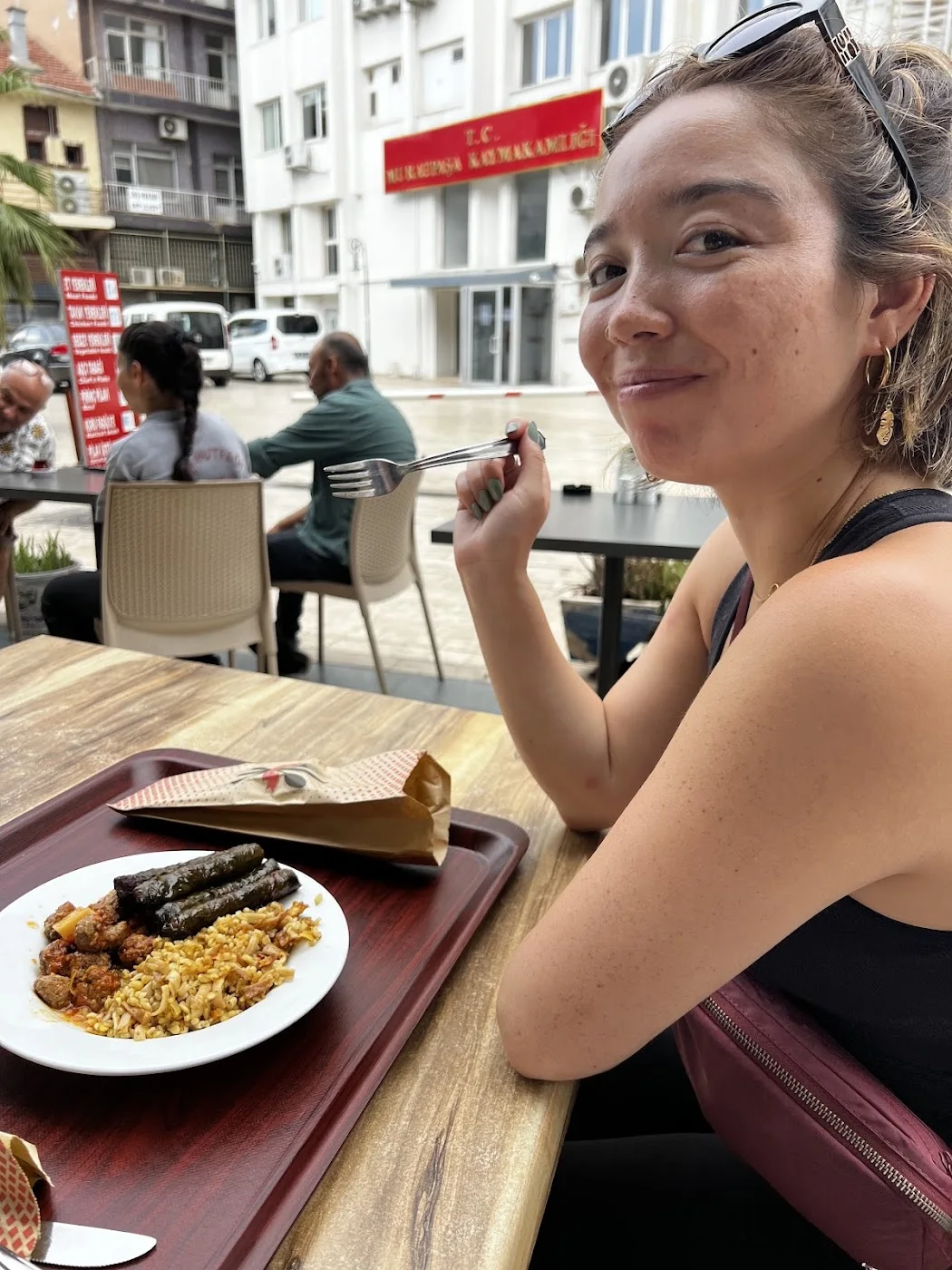 Melissa smiling at her table