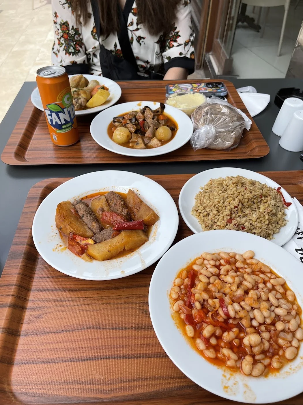 A lunch tray with beans and stew