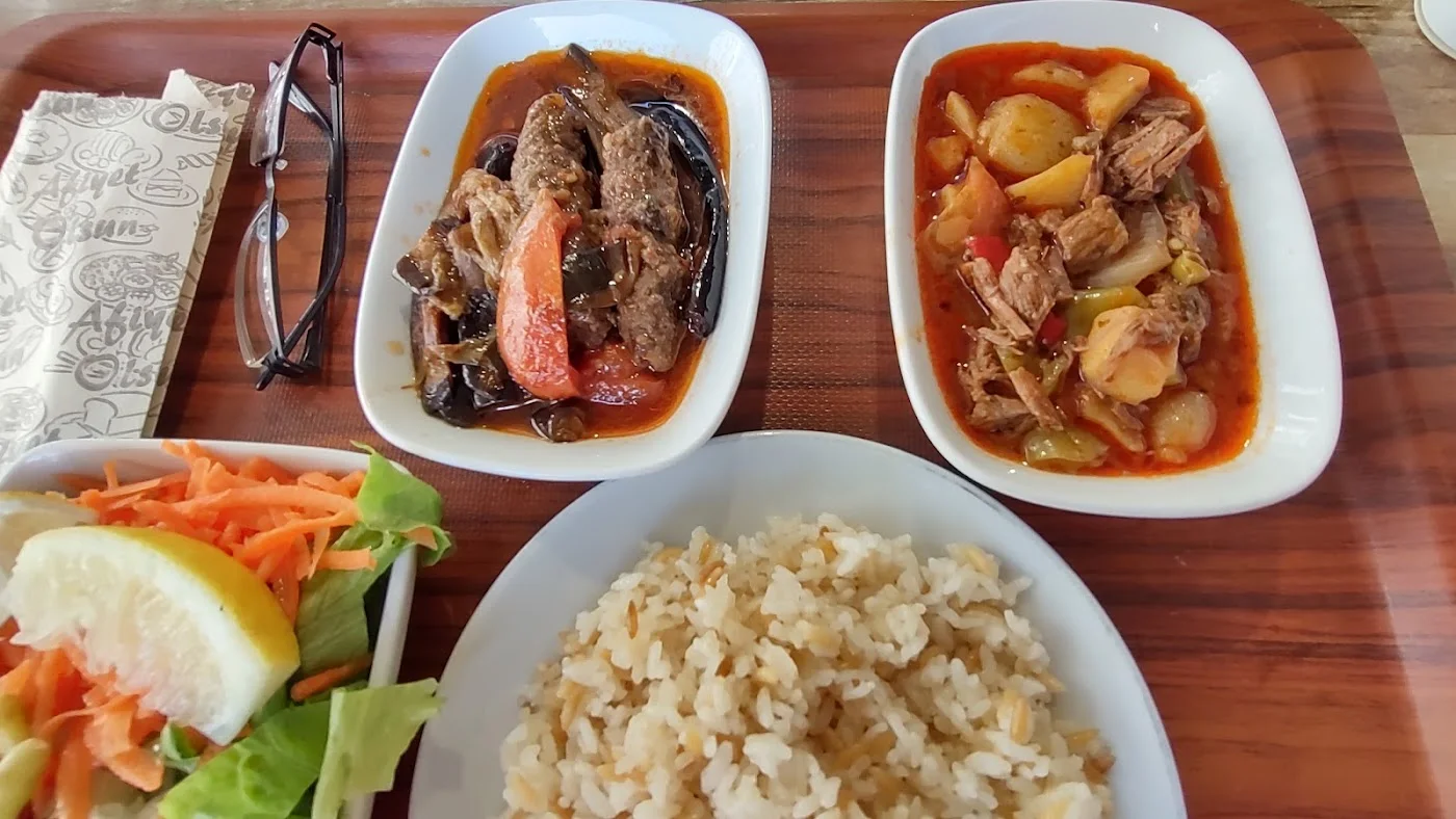 Aubergine with lamb, stew and rice